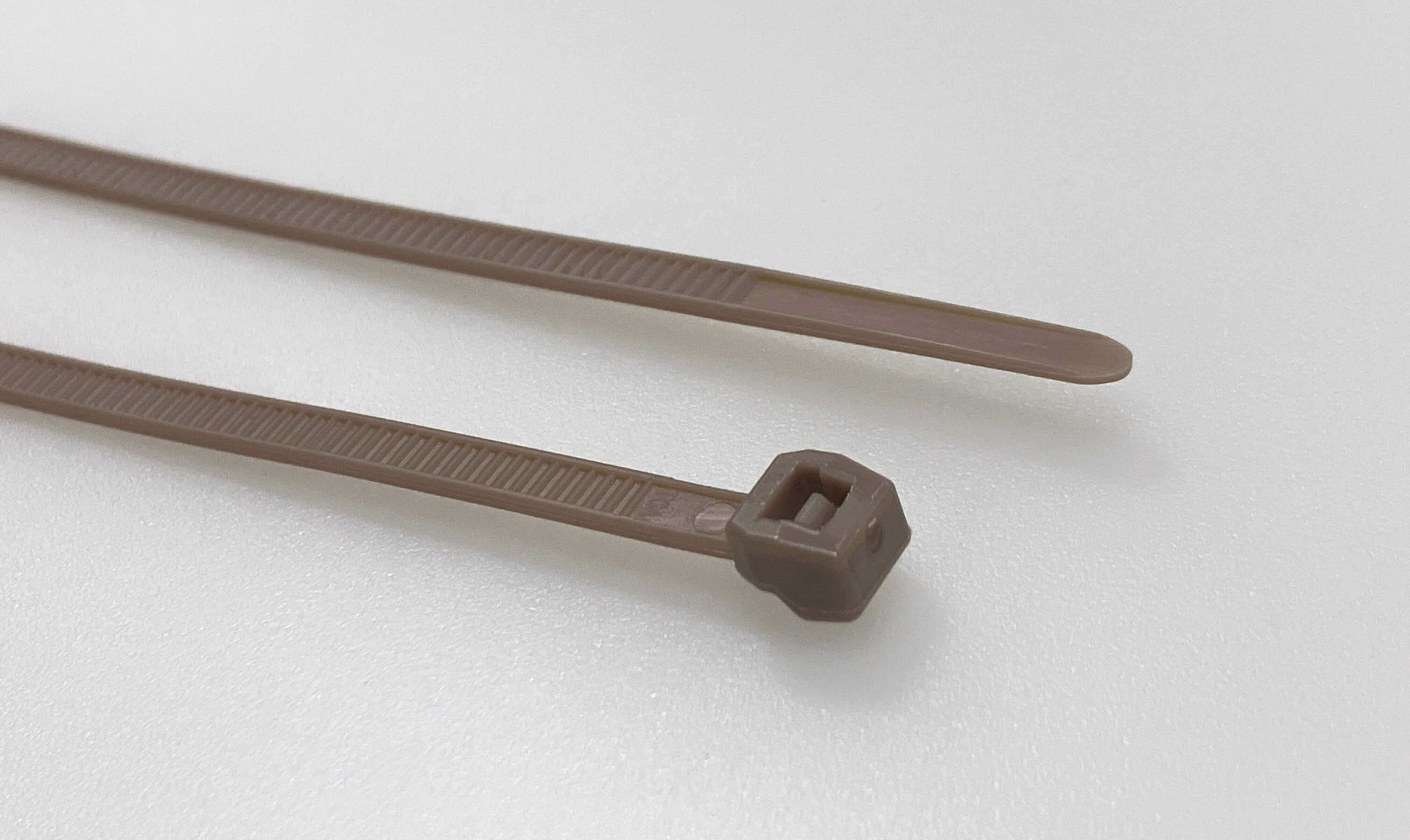 Cable tie outside serrated, 145.0x3.4mm, ⌀4.0-35.0mm, beige